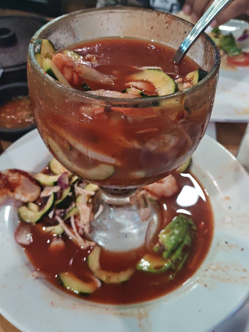 Mexican seafood dishes arranged for dining.