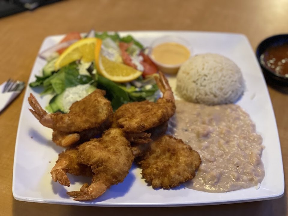 Restaurant menu with platters and rolls.