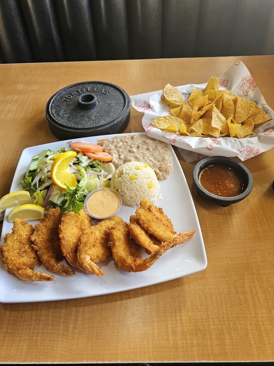 Restaurant menu with platters and rolls.