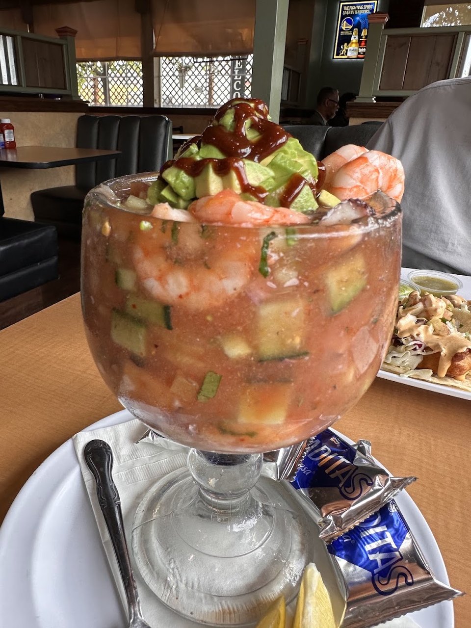 Printed menu with seafood and Mexican dishes.